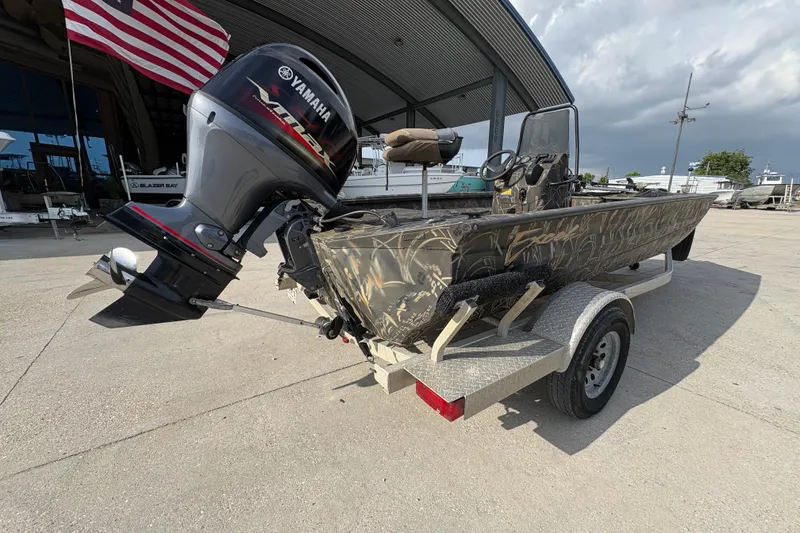 Slide: The Image of 2018 Excel 1854 Shallow Water F4 Console boat with Yamaha motor on trailer. - 3