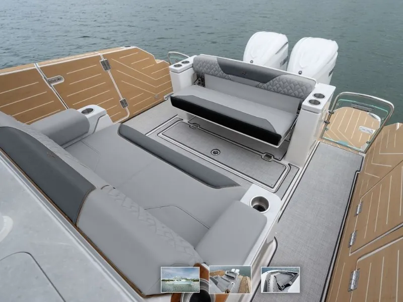 Slide: The Image of The image shows the stern of a Regal 34 SAV boat with gray upholstery and two engines. - 3