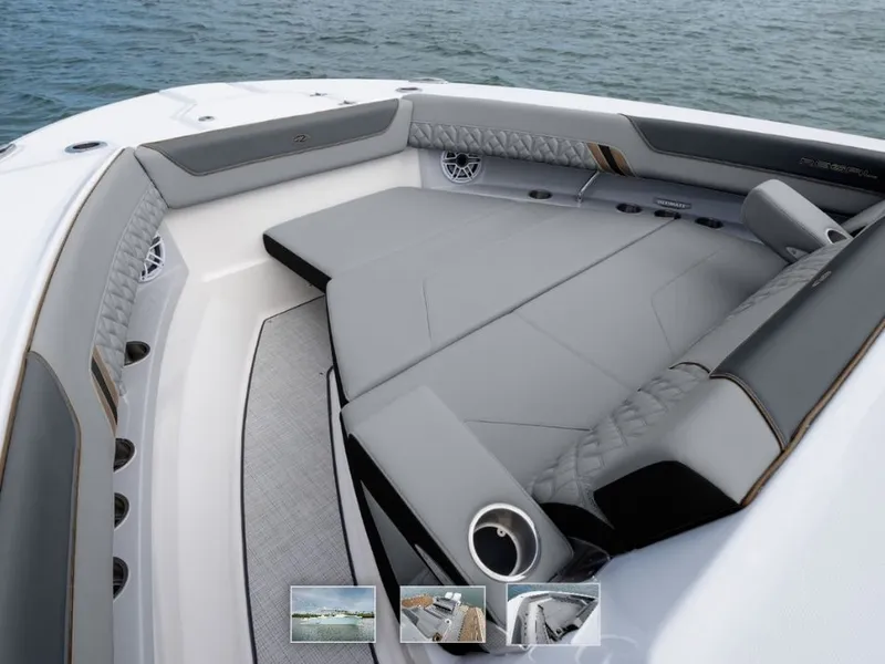 Slide: The Image of Regal 34 SAV 2027: Luxurious lounging area on a modern boat, surrounded by water. - 4