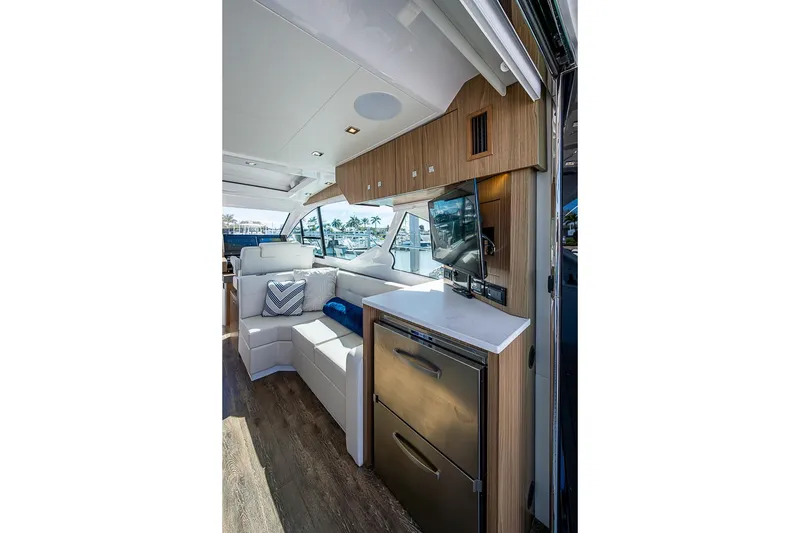 Slide: The Image of Luxurious interior of 2025 Cruisers Yachts 50 Cantius with modern seating and appliances. - 12
