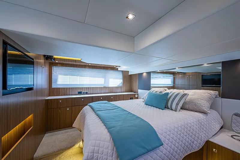 Slide: The Image of Luxurious bedroom interior of 2025 Cruisers Yachts 50 Cantius with modern design and elegant decor. - 19