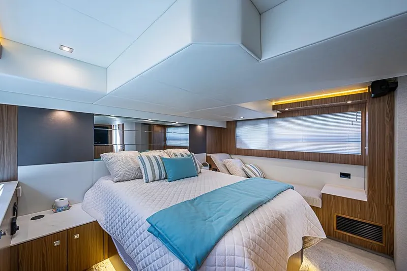 Slide: The Image of Luxurious bedroom interior of 2025 Cruisers Yachts 50 Cantius with modern design and cozy bedding. - 20