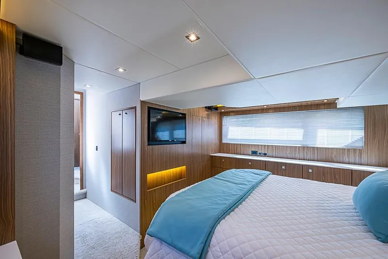 Slide: The Image of Luxurious bedroom interior of 2025 Cruisers Yachts 50 Cantius with modern design and amenities. - 24