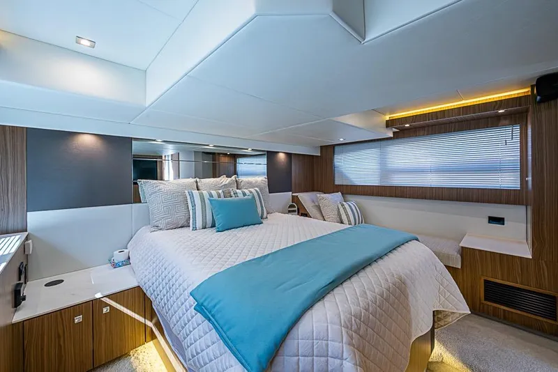 Slide: The Image of Luxurious bedroom interior of 2025 Cruisers Yachts 50 Cantius with modern design and cozy bedding. - 27