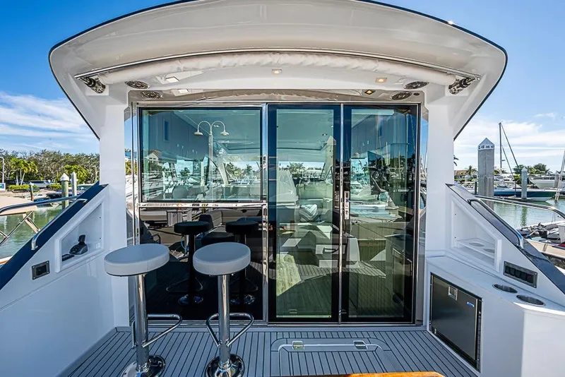 Slide: The Image of 2025 Cruisers Yachts 50 Cantius luxury yacht with sleek design and modern amenities. - 46