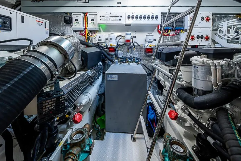 Slide: The Image of Engine room of 2025 Cruisers Yachts 50 Cantius, showcasing advanced marine machinery. - 65