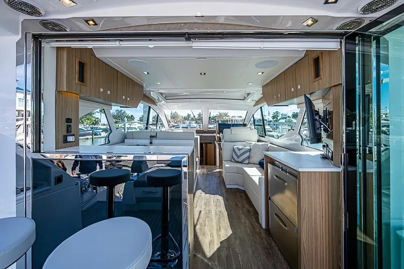 Slide: The Image of Luxurious interior of 2025 Cruisers Yachts 50 Cantius with modern furnishings and open layout. - 7