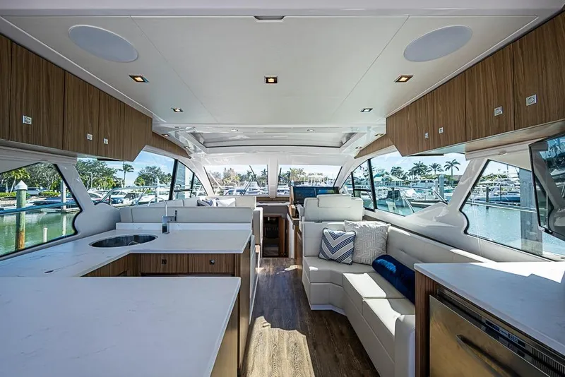 Slide: The Image of Luxurious interior of 2025 Cruisers Yachts 50 Cantius with modern design and spacious seating. - 9