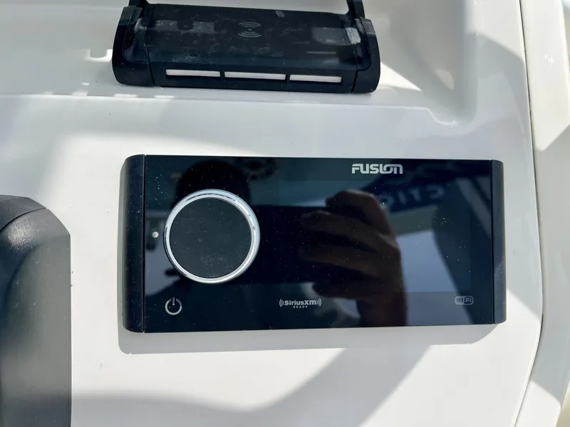 Slide: The Image of A Fusion audio system is installed on a boat. - 12