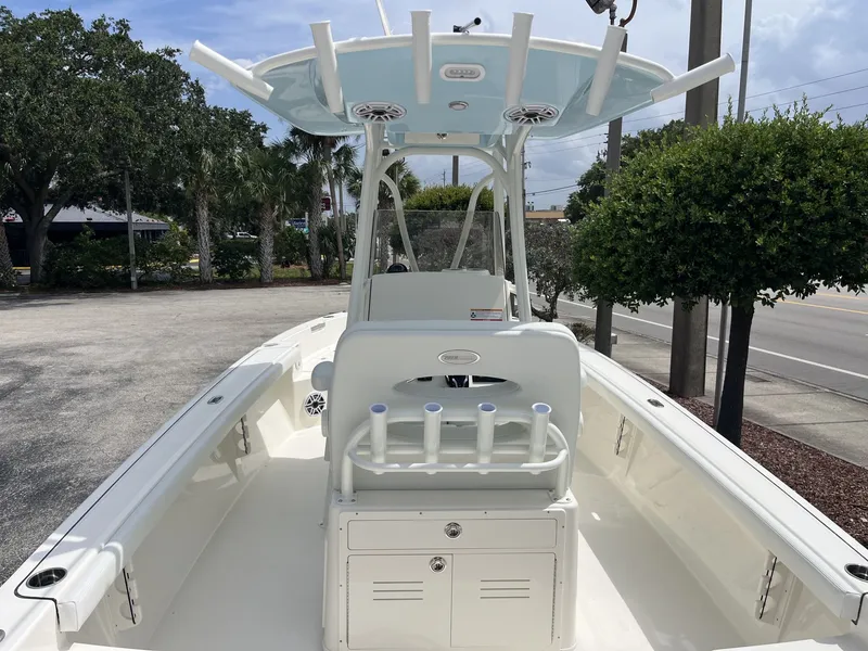 Slide: The Image of Pathfinder 2400 Hybrid 2027: A modern boat with T-top, rod holders, and spacious deck. - 9