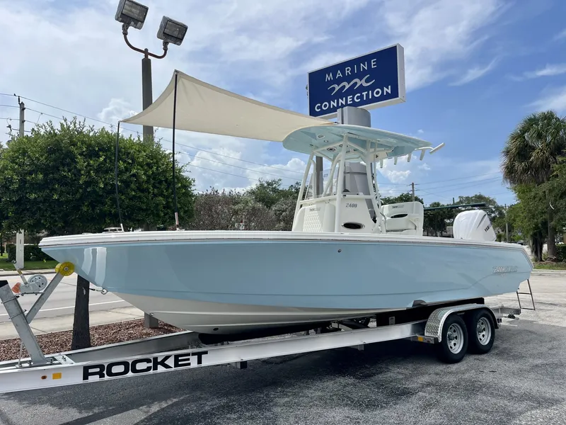Slide: The Image of 2027 Pathfinder 2400 Hybrid on a trailer outdoors. - 31