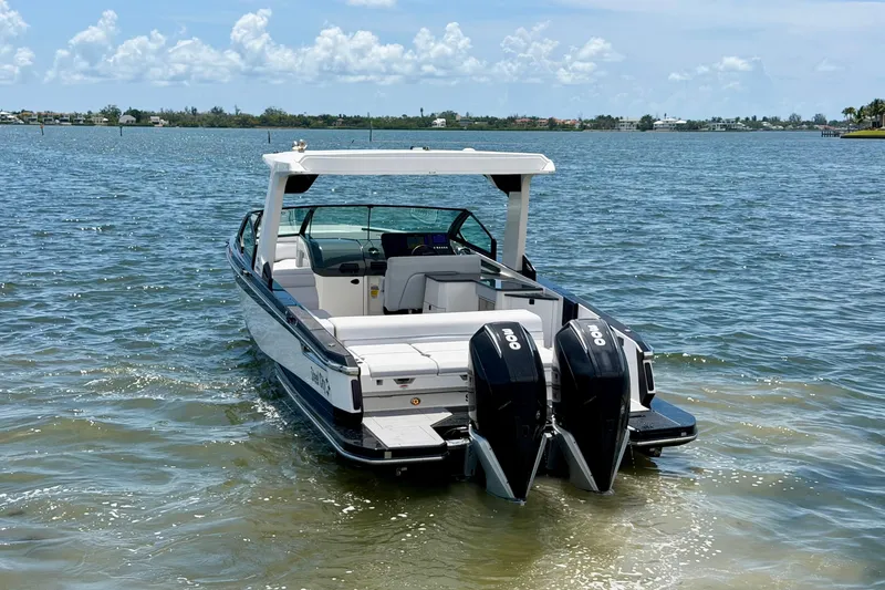 Slide: The Image of 2022 Aviara AV32 OB boat with dual engines on a sunny day. - 12