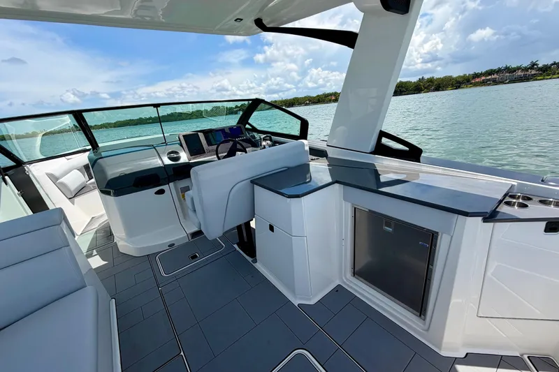 Slide: The Image of Luxurious 2022 Aviara AV32 OB boat interior with sleek design and modern amenities on a sunny day. - 28