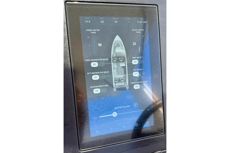 Slide: The Image of Touchscreen control panel on 2022 Aviara AV32 OB boat, displaying water tank levels and bilge settings. - 49