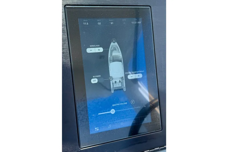 Slide: The Image of Touchscreen control panel on 2022 Aviara AV32 OB boat, displaying navigation and system settings. - 51
