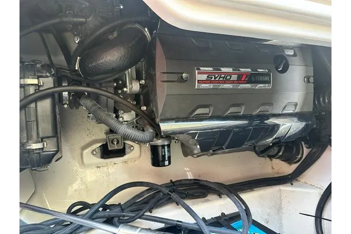 Slide: The Image of Engine compartment of 2021 Yamaha Boats 275SD, featuring SVHO engine components. - 10