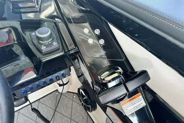 Slide: The Image of Control panel of 2021 Yamaha Boats 275SD, featuring sleek design and modern controls. - 15