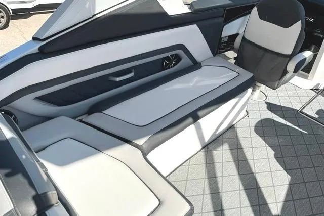 Slide: The Image of Interior of 2021 Yamaha Boats 275SD, featuring sleek seating and modern design elements. - 23