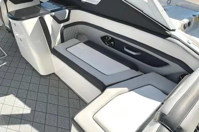 Slide: The Image of 2021 Yamaha Boats 275SD interior with sleek seating and modern design. - 24
