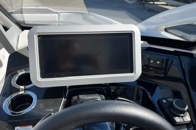 Slide: The Image of Dashboard of 2021 Yamaha Boats 275SD with touchscreen and controls. - 30