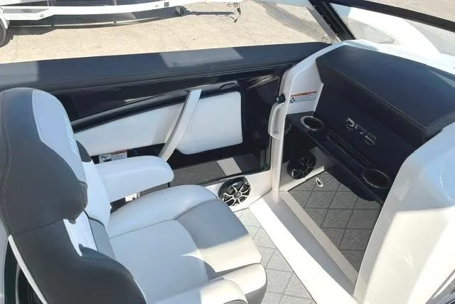 Slide: The Image of 2021 Yamaha Boats 275SD interior with sleek seating and modern dashboard design. - 33