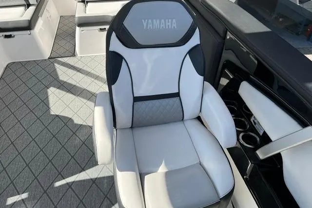Slide: The Image of 2021 Yamaha Boats 275SD interior with luxurious seating and modern design. - 35