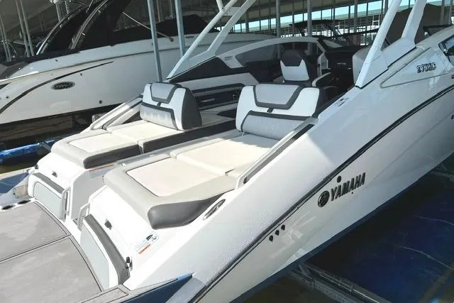 Slide: The Image of 2021 Yamaha Boats 275SD luxury boat with sleek design and comfortable seating. - 4