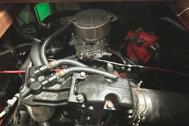 Slide: The Image of Engine compartment of a 1989 Carver 32 Aft Cabin Motor Yacht, showcasing mechanical components. - 28