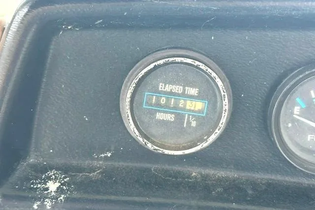 Slide: The Image of Elapsed time gauge on 1989 Carver 32 Aft Cabin Motor Yacht dashboard. - 31