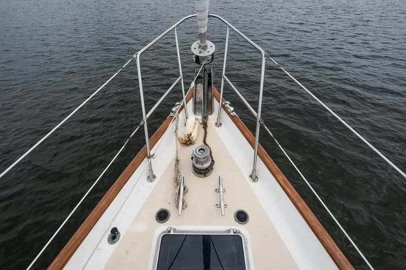 Slide: The Image of Bow view of 1992 Morris Ocean Series 44 sailboat on calm water. - 7