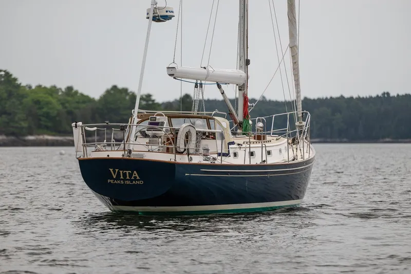 Slide: The Image of Sailing yacht "Vita" on water, Morris Ocean Series 44, 1992 model, Peaks Island backdrop. - 62