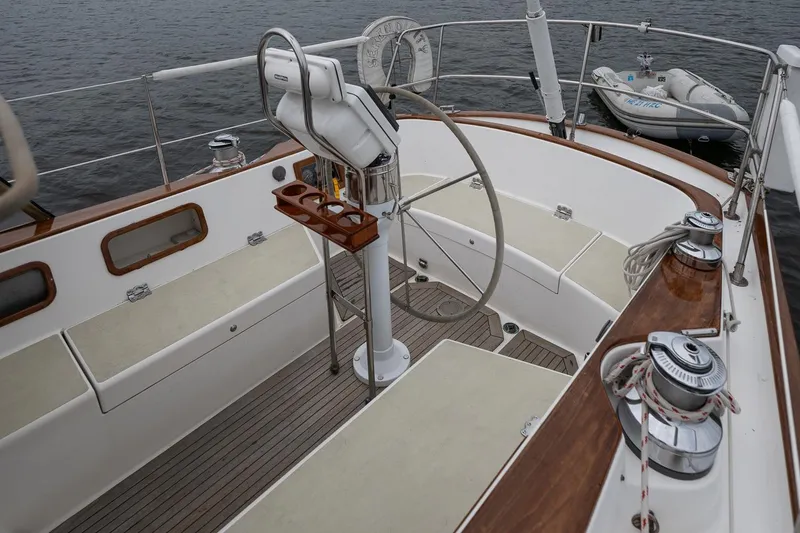 Slide: The Image of Cockpit of 1992 Morris Ocean Series 44 sailboat with steering wheel and seating. - 16
