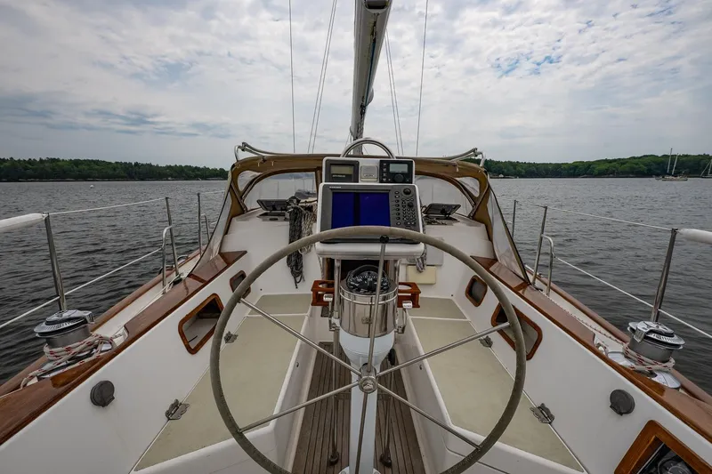 Slide: The Image of Cockpit view of 1992 Morris Ocean Series 44 sailboat on calm water under cloudy sky. - 19