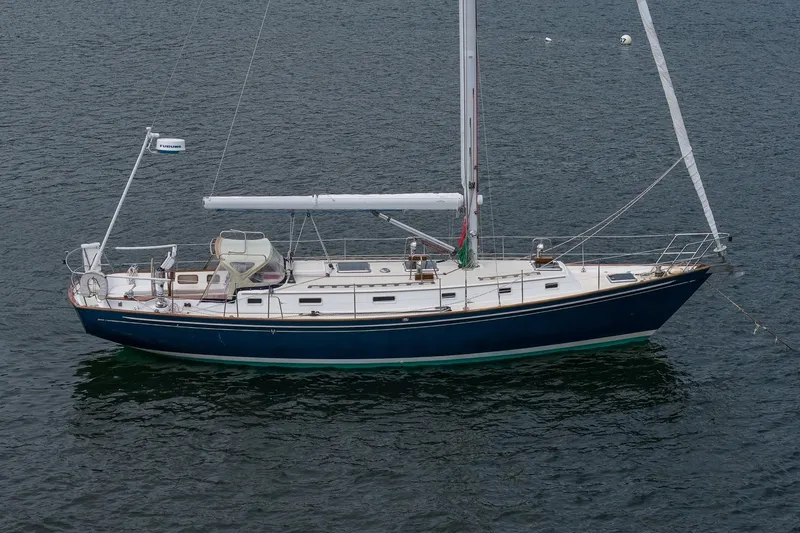 Slide: The Image of Sailboat on water, 1992 Morris Ocean Series 44, blue hull, white deck, moored. - 60