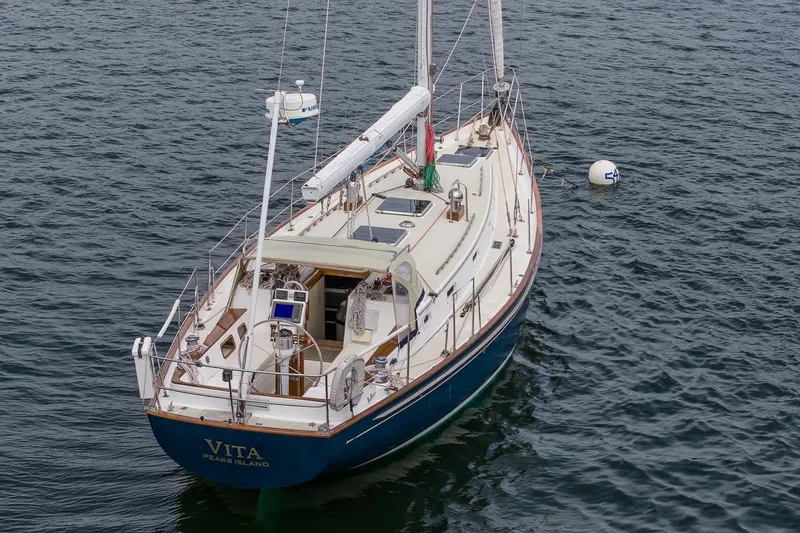 Slide: The Image of Sailboat "Vita" on water, Morris Ocean Series 44, 1992 model, moored near buoy. - 61