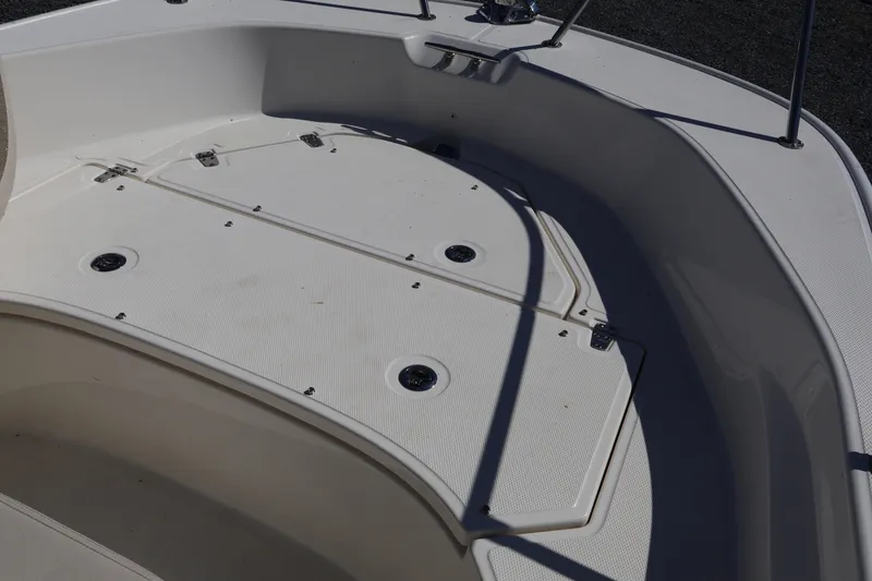 Slide: The Image of 2023 Boston Whaler 170 Montauk boat deck with storage compartments. - 33
