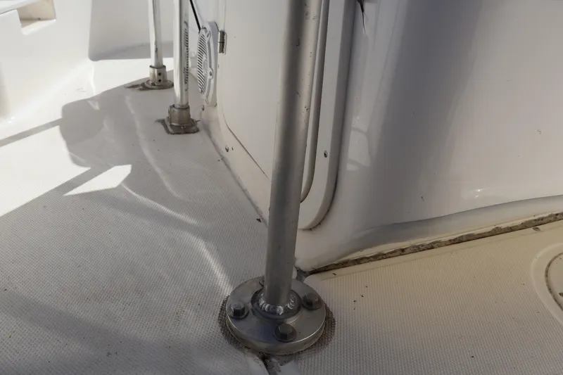 Slide: The Image of 2023 Boston Whaler 170 Montauk boat deck with stainless steel fittings. - 36