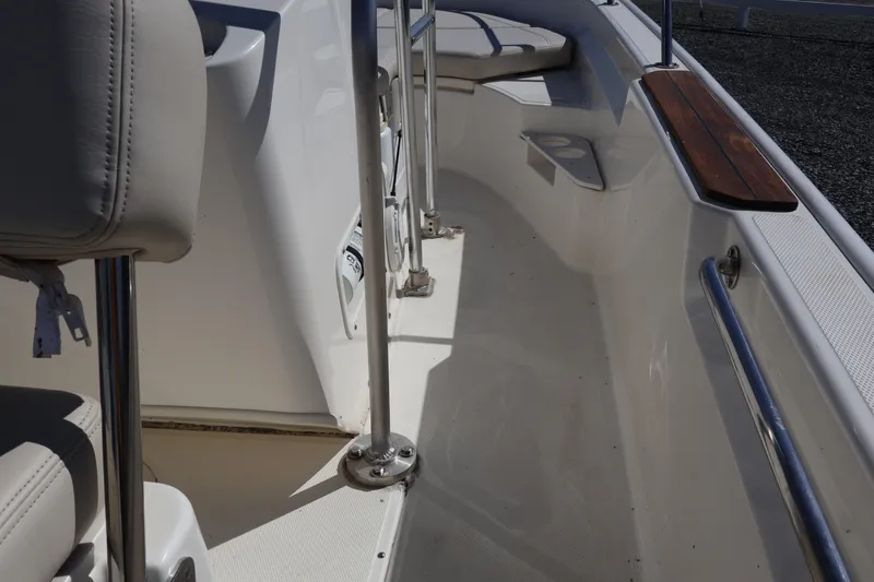 Slide: The Image of 2023 Boston Whaler 170 Montauk interior with seating and stainless steel railings. - 41