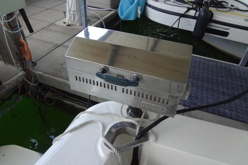Slide: The Image of Stainless steel grill mounted on a 2005 Silverton 34 Convertible boat. - 19