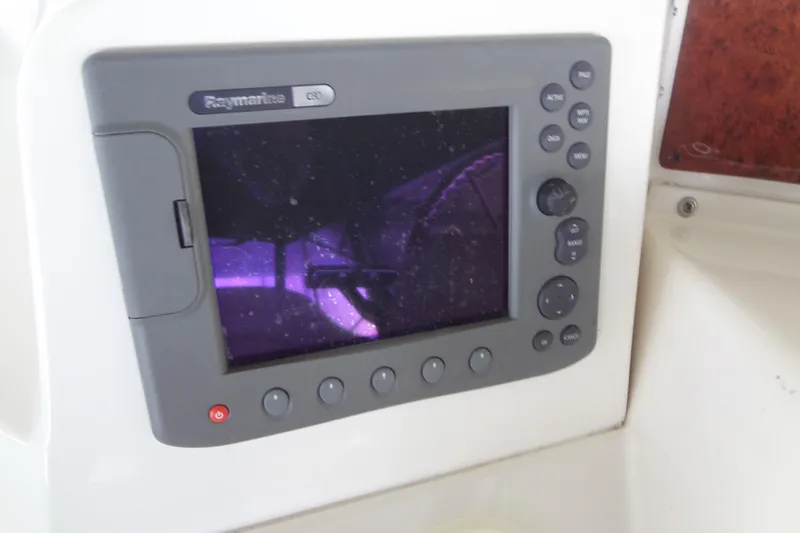 Slide: The Image of Raymarine C80 display on 2005 Silverton 34 Convertible boat dashboard. - 25