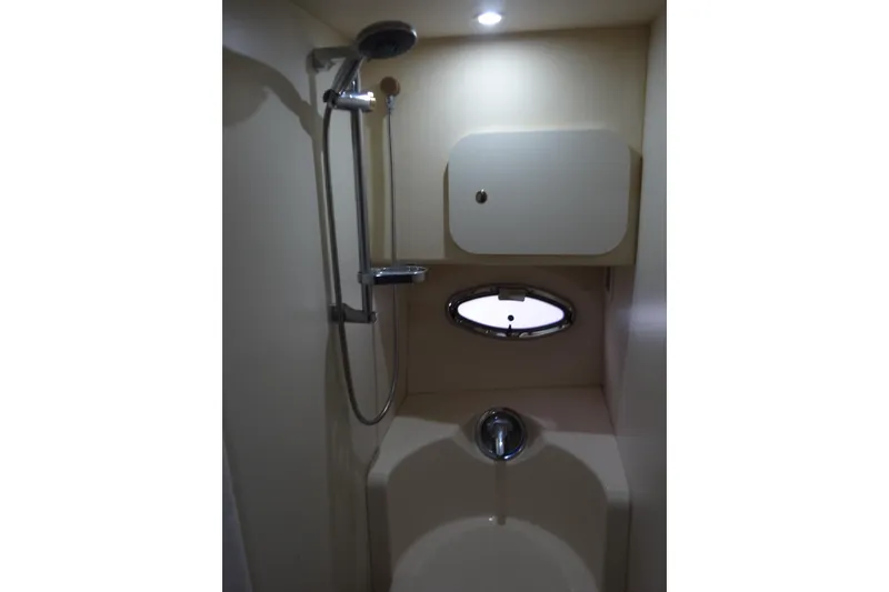 Slide: The Image of Bathroom shower area in a 2005 Silverton 34 Convertible yacht. - 51
