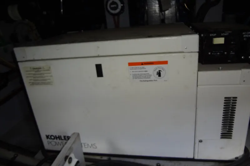 Slide: The Image of Kohler power system in 2005 Silverton 34 Convertible boat engine room. - 55