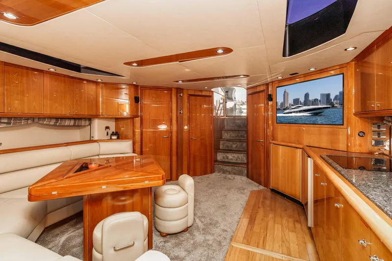 Slide: The Image of Luxurious interior of 2005 Sunseeker Predator 68 yacht with elegant wood finishes and modern amenities. - 24