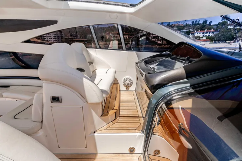 Slide: The Image of Luxurious interior of 2005 Sunseeker Predator 68 yacht with sleek design and comfortable seating. - 16