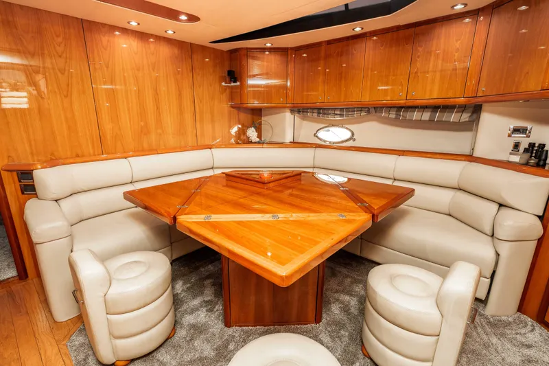 Slide: The Image of Luxurious interior of 2005 Sunseeker Predator 68 yacht with elegant wood and leather seating. - 18