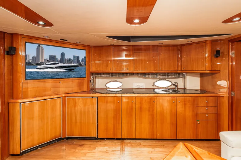 Slide: The Image of Luxurious wooden interior of 2005 Sunseeker Predator 68 yacht kitchen area. - 22