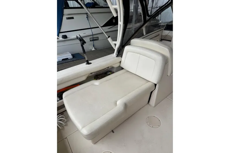 Slide: The Image of 2020 Grady White 275 Freedom boat interior with white cushioned seating. - 14