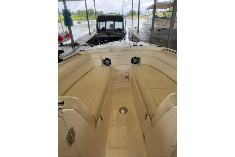 Slide: The Image of 2020 Grady White 275 Freedom boat interior with seating, docked at marina. - 15