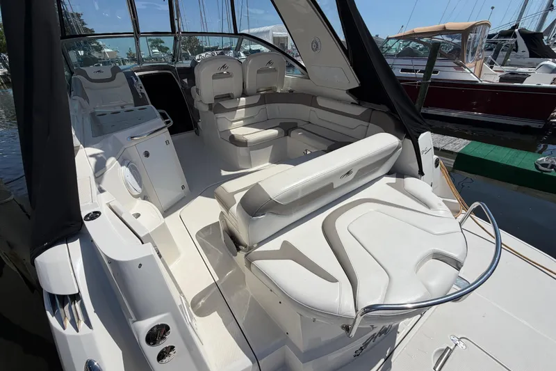 Slide: The Image of Luxurious 2009 Monterey 340 Sport Yacht interior with plush seating and sleek design. - 14