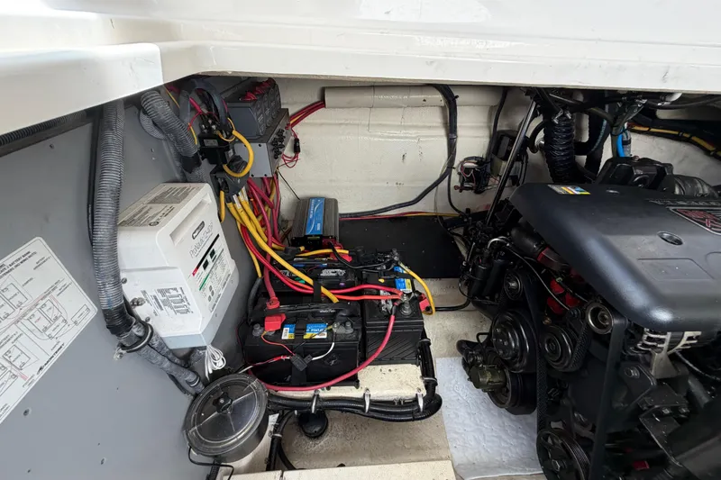 Slide: The Image of Engine compartment of a 2009 Monterey 340 Sport Yacht, showing batteries and wiring. - 51